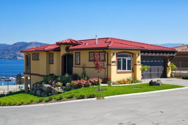 chardonnay roofed home with parmesan main body overlooking okanagan lake on a cllear day