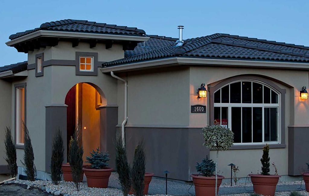 exterior evening shot of a west harbour home with lights on