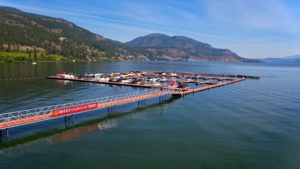 aerial shot of the marina with mountains in full view