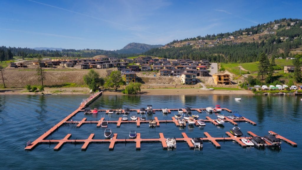 aerial shot of the marina facing west harbour development with mountains in view